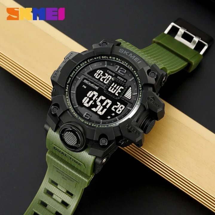 Digital watch with green strap on a wooden surface, featuring the Skmei brand.