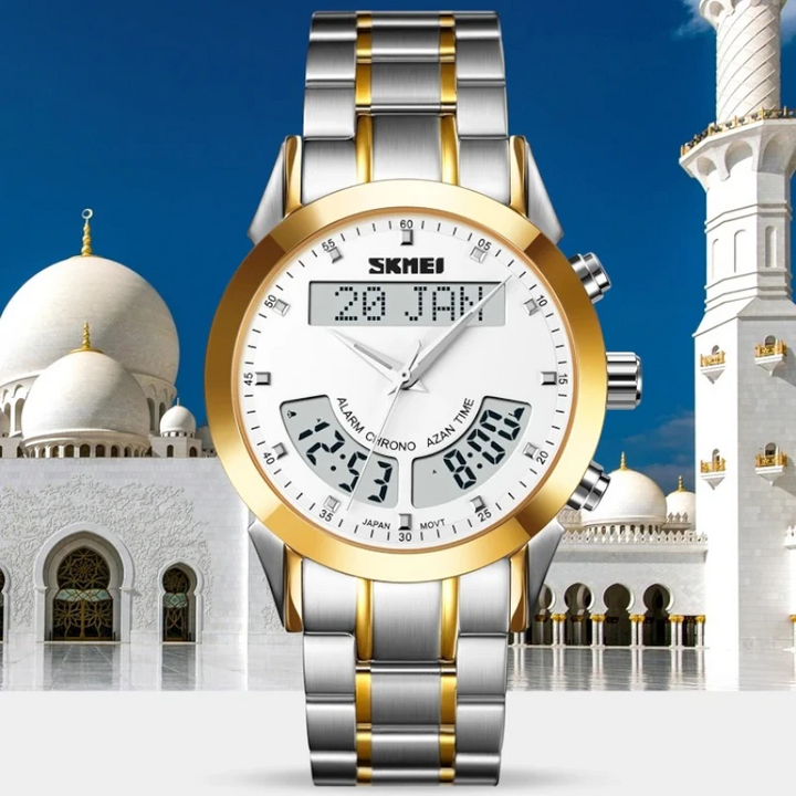 Gold and silver watch with digital display in front of a mosque